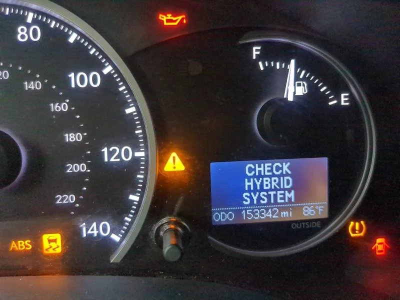 Prius dashboard showing Check Hybrid System warning with ABS and VSC lights on