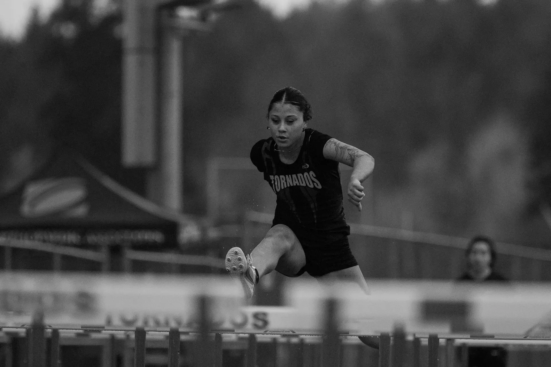 Eliana Lewis of Yelm High School clearing hurdles during the 100m event.