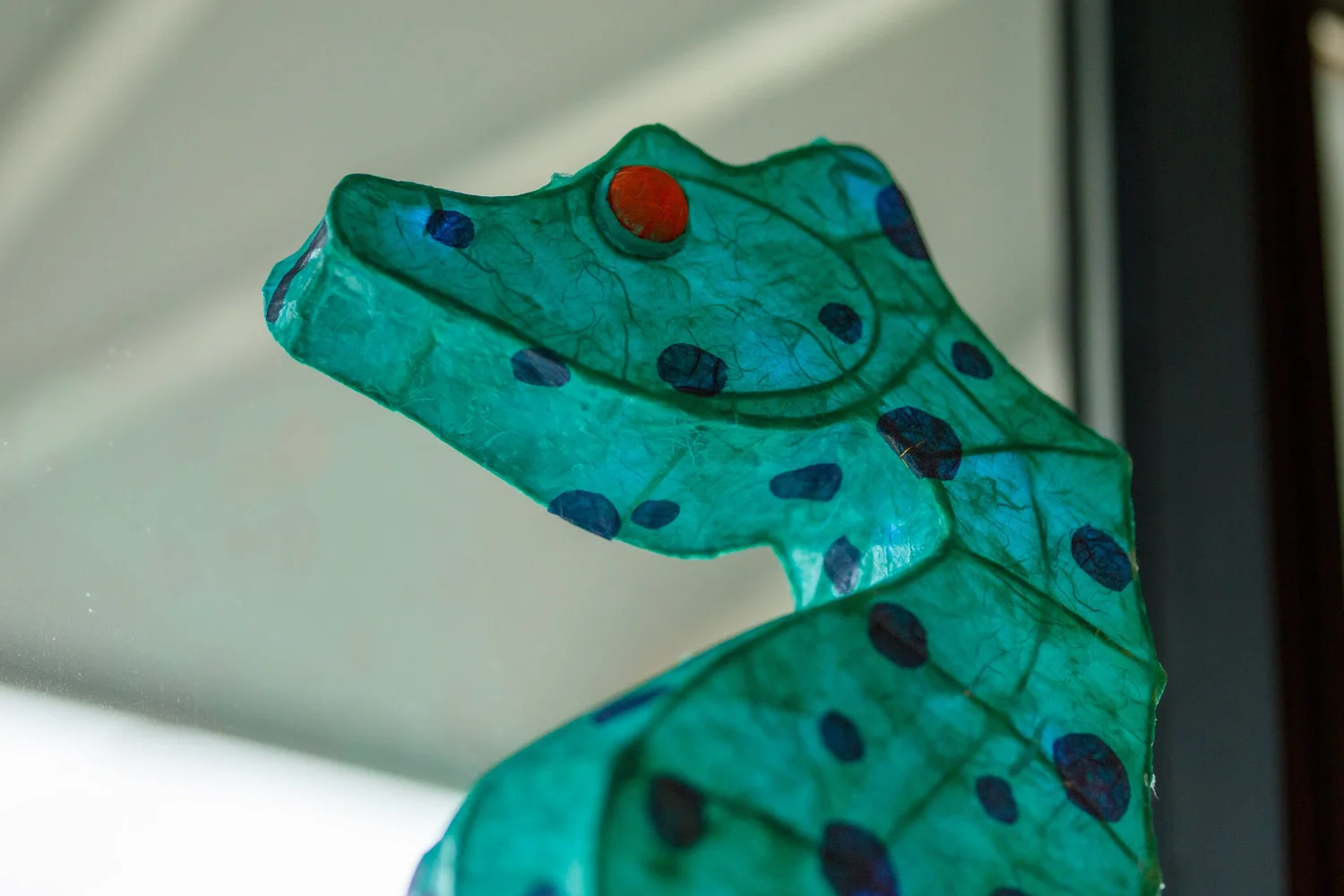 Teal seahorse luminary sculpture at the Light in the Dark exhibit, AHA Museum, Olympia
