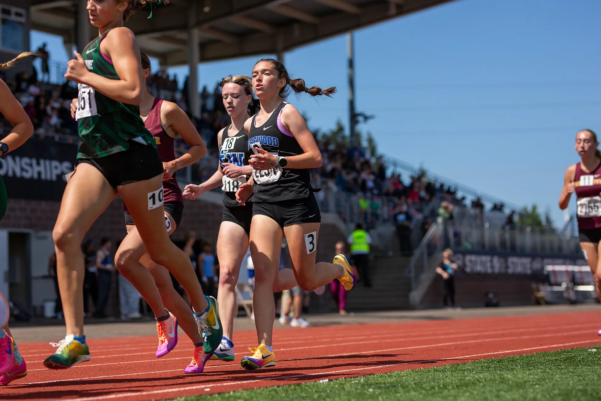 Olivia Decker running the 1600m for Shorewood High School at WIAA State - Frame 10