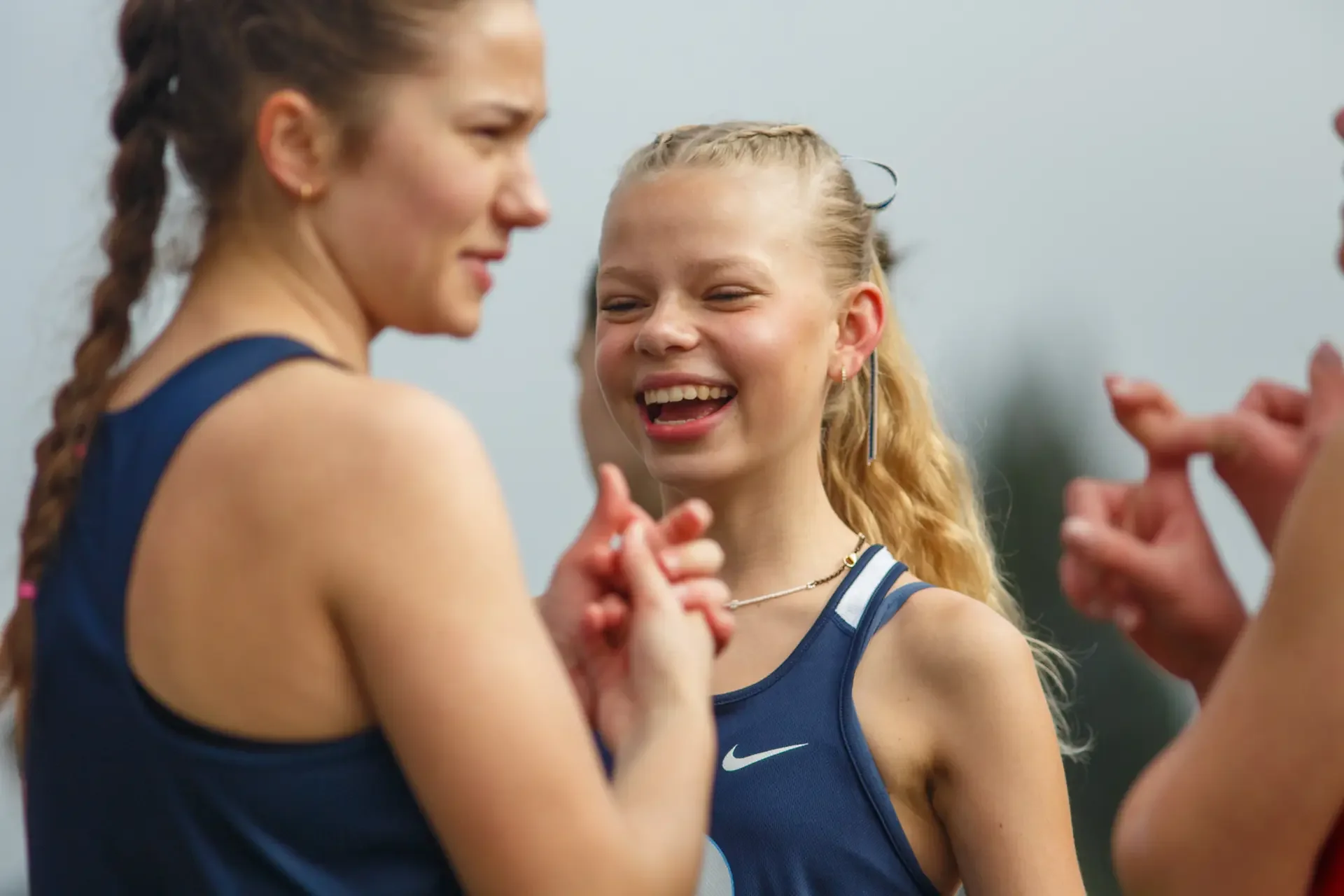 Olympia High School track athletes showing determination at the Bear Relays.