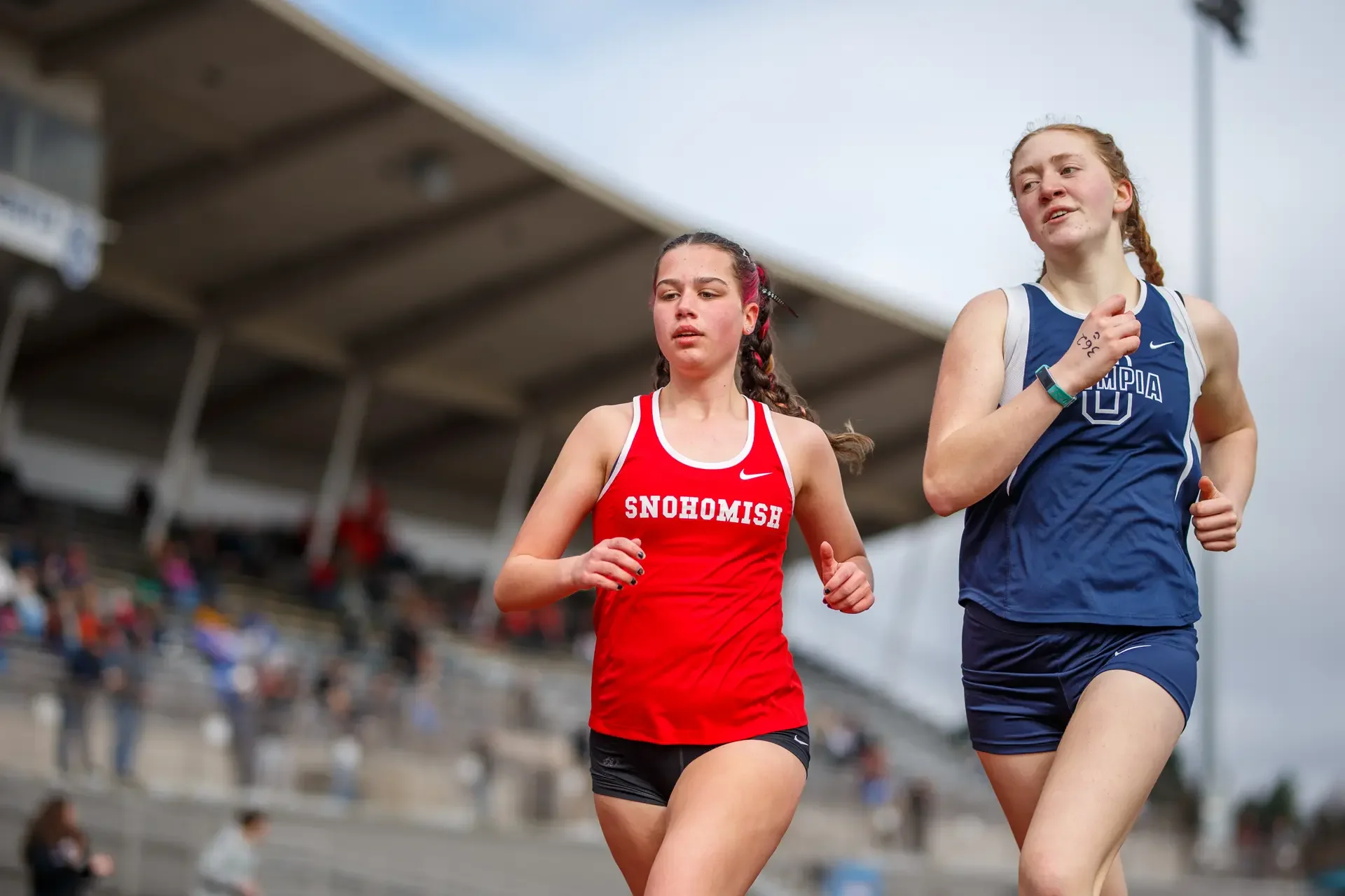 A pack of Olympia High School track athletes competing in the 1600m race at the Bear Relays.
