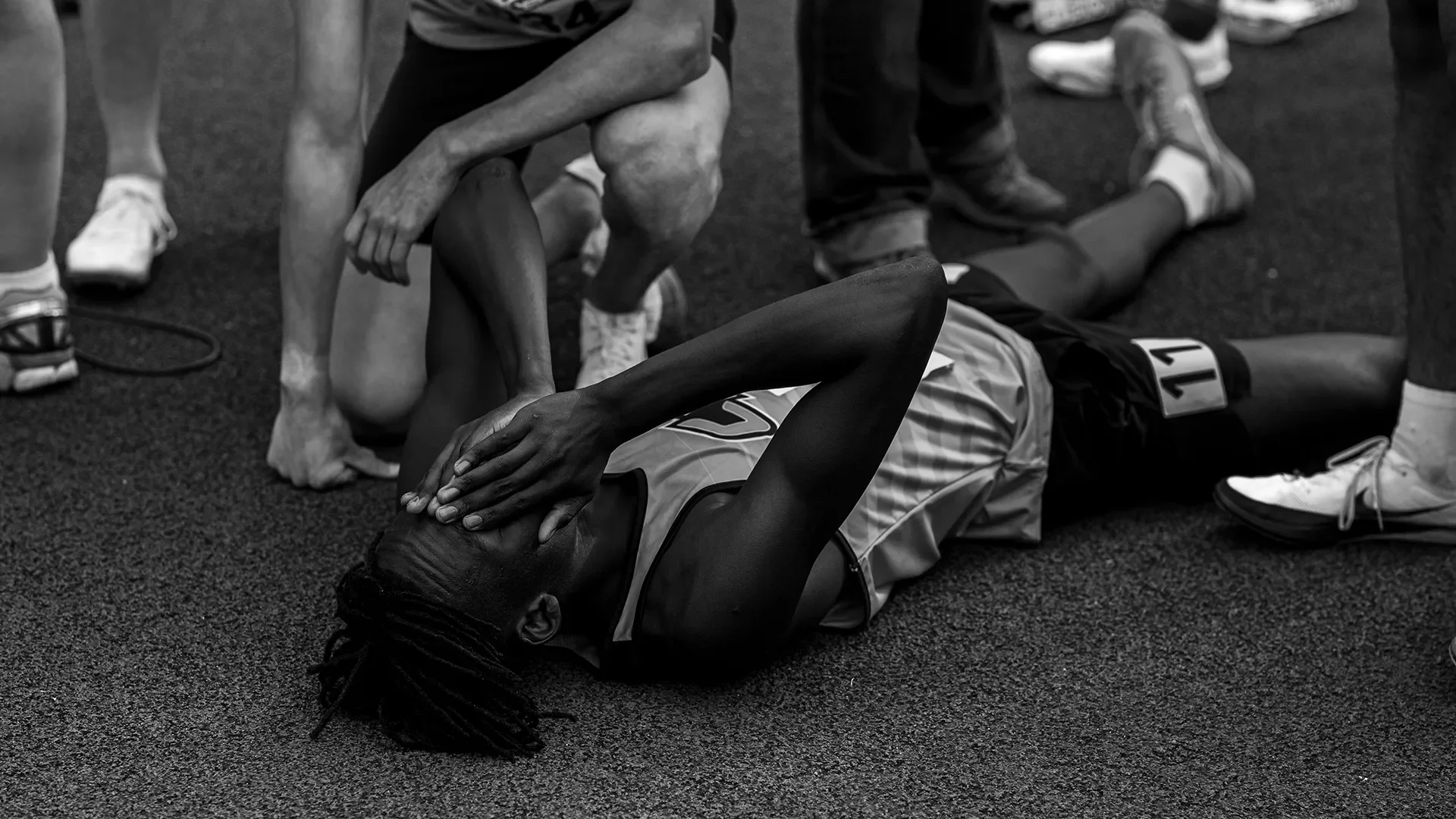 A runner leaving everything on the track at the WIAA State Championships