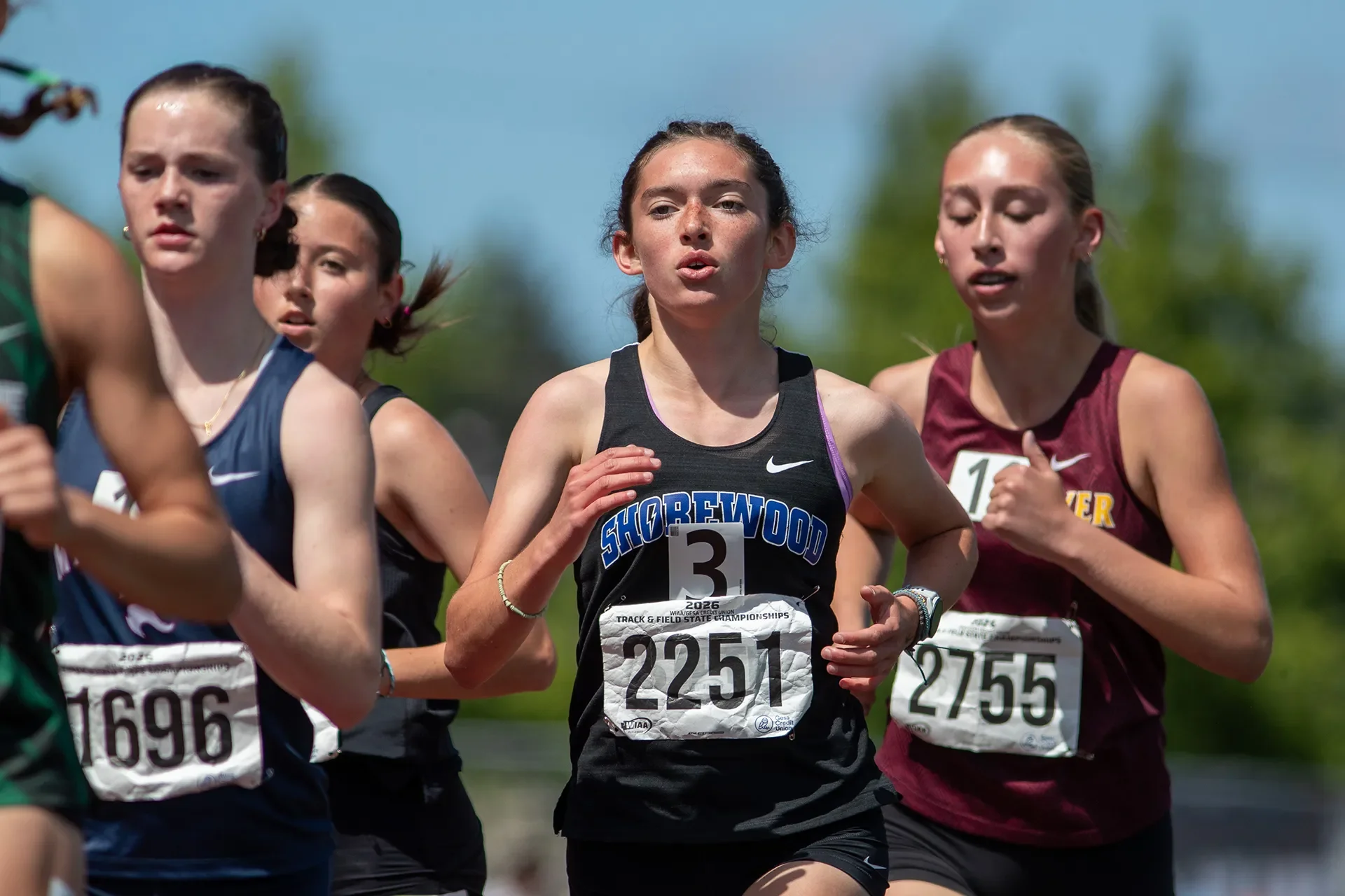 Olivia Decker running the 1600m for Shorewood High School at WIAA State - Frame 9