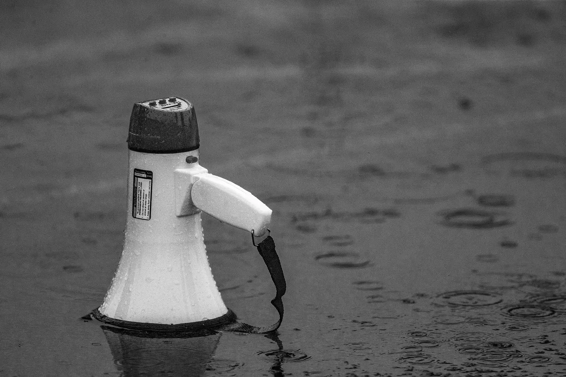 Olympia High School track meet megaphone rain detail