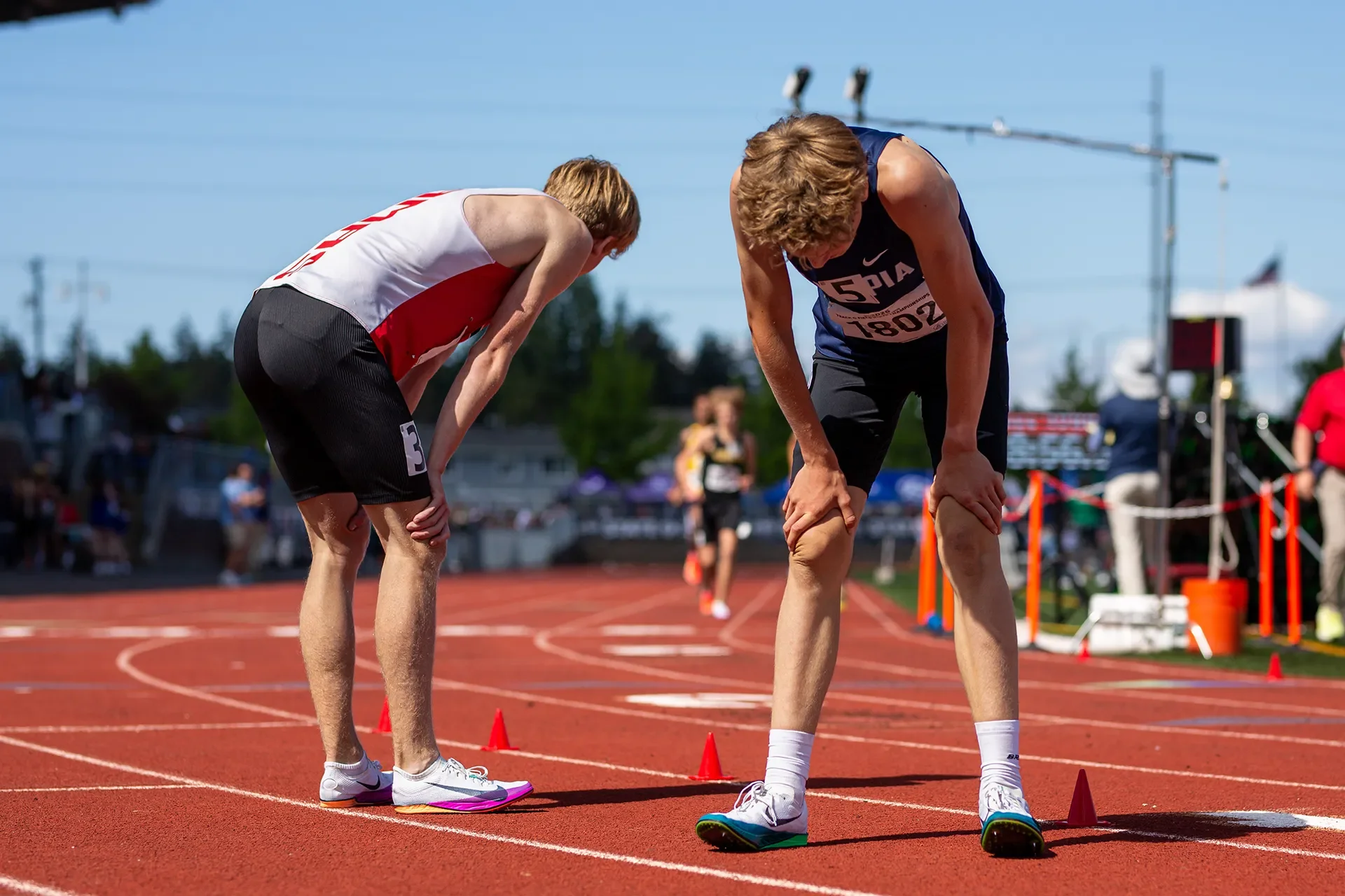 Cohen Butler and Quenton Lanese after the 4A boys 3200m at the 2026 WIAA State Championships