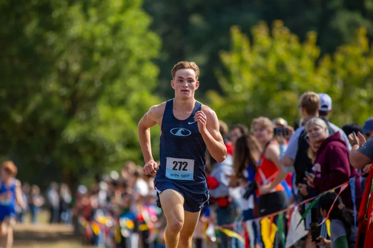 Max Dower of Gig Harbor racing the 2025 Olympia XC Classic at LBA Park — All-PSL senior