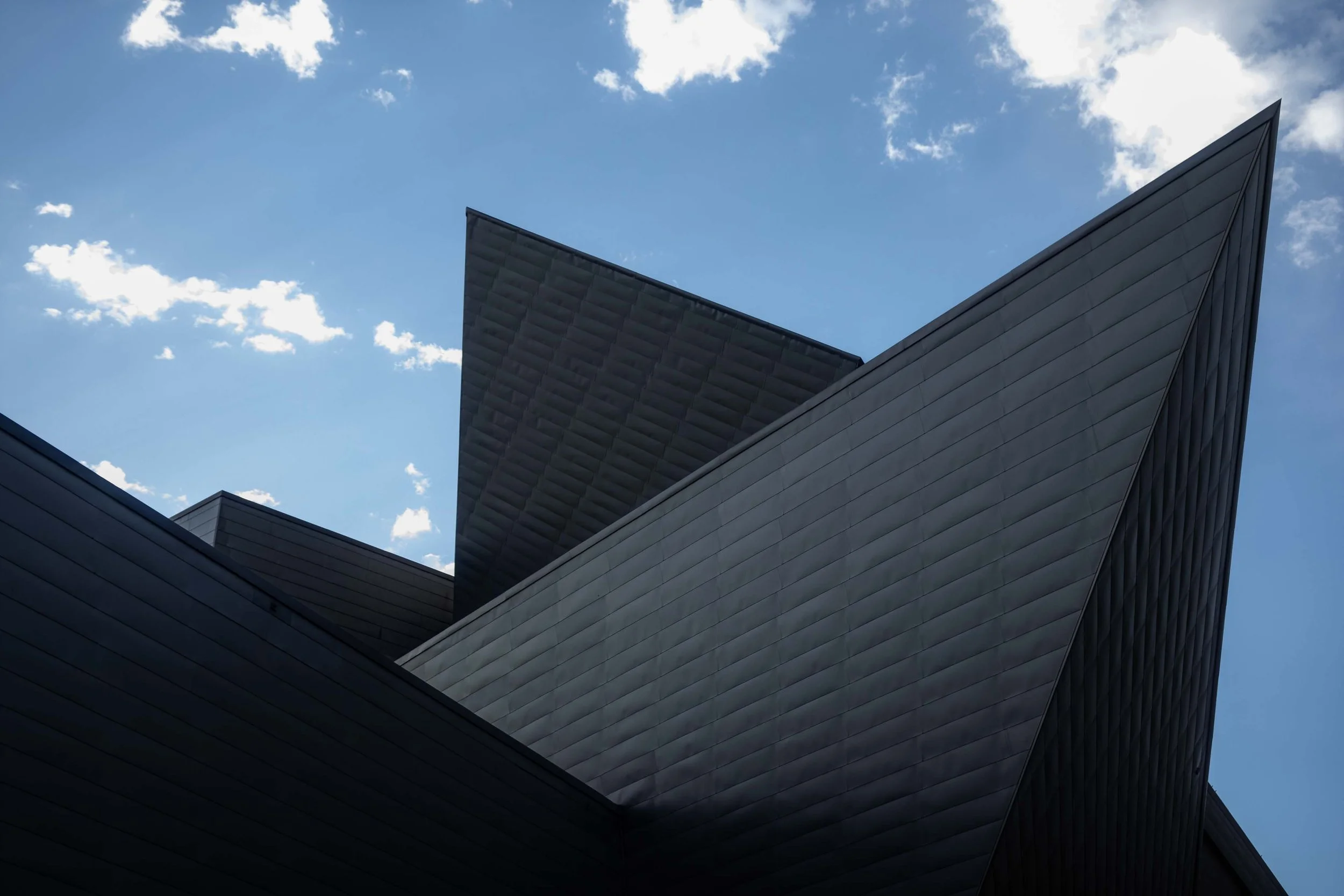 Precision manufacturing, architectural glass and metal — commercial photography by Russell Moore