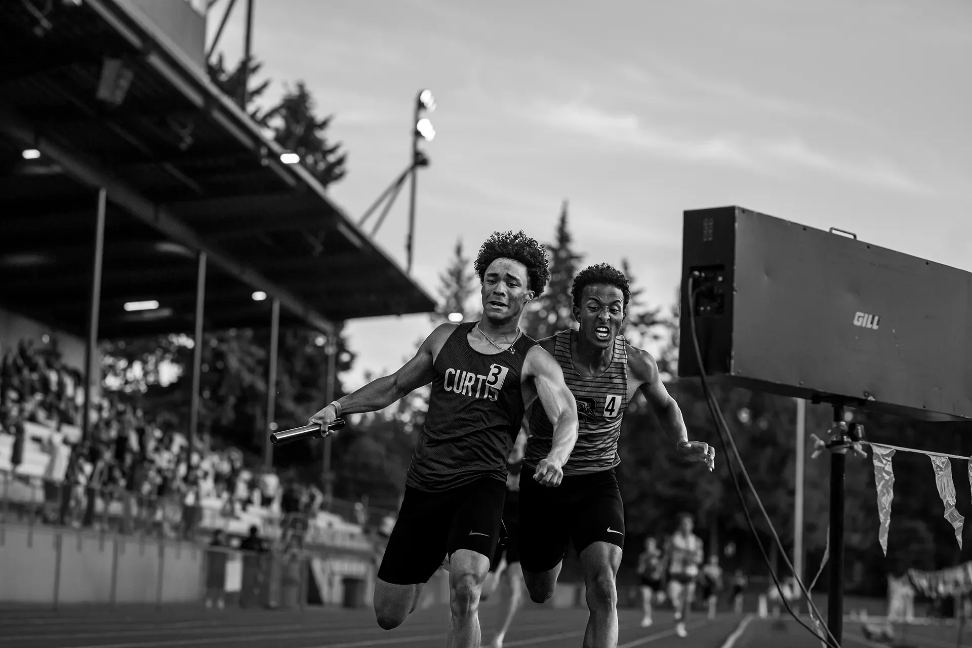 Curtis and Rogers battle in the 4x400m relay at the 2026 district championships