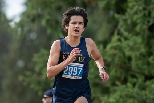 Kevin Hu of Pope John Paul II cross country. Photo by Russell Moore.
