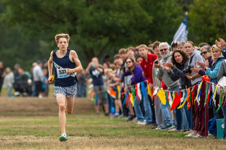 Olympia freshman Quenton Lanese leading the freshman boys race at the 2025 Olympia XC Classic, LBA Park — national freshman record holder