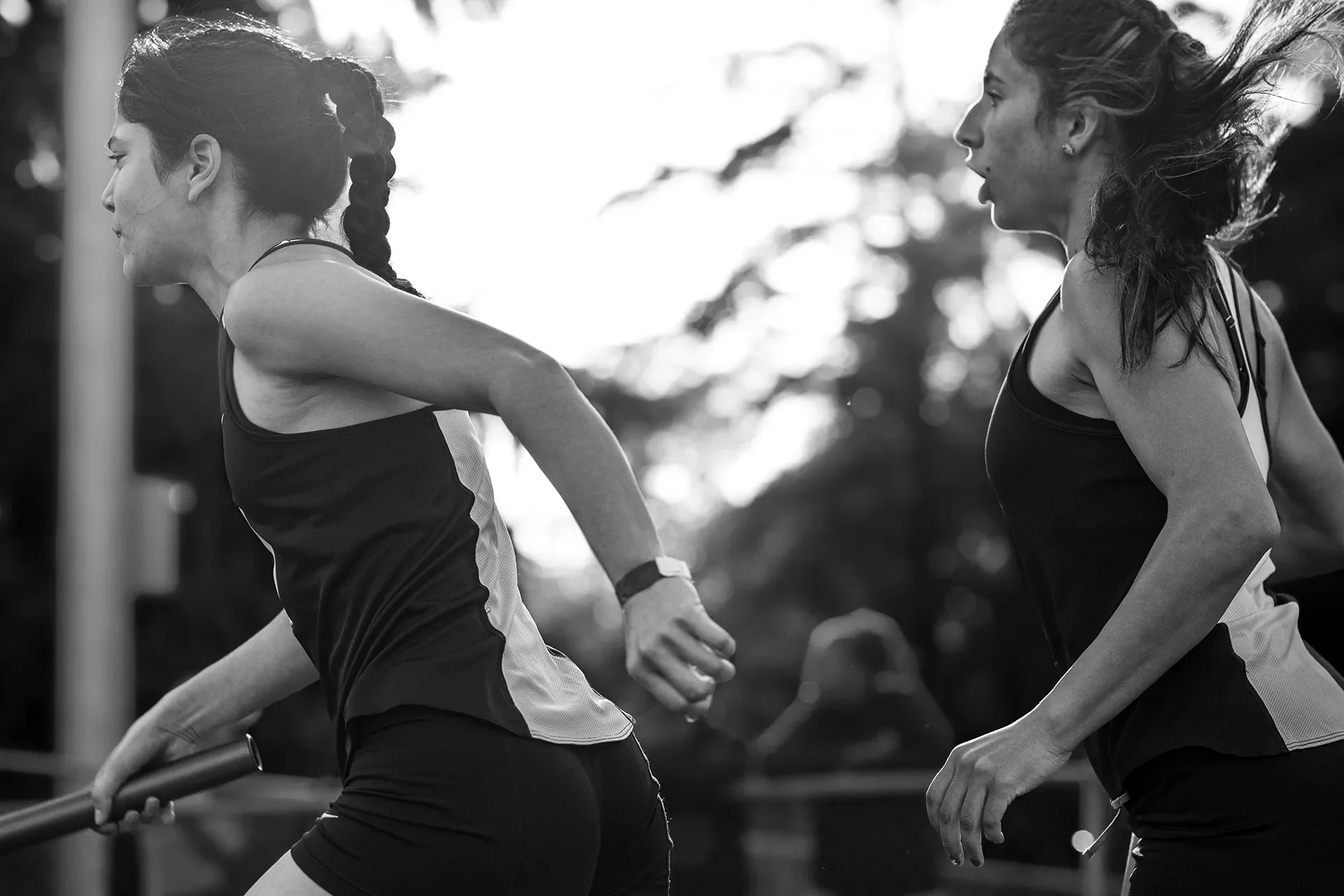 Olympia girls 4x200m relay exchange at the 2026 district championships