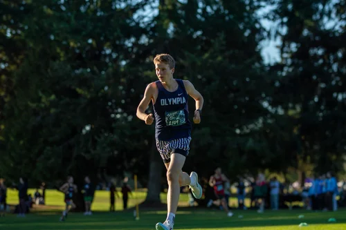 Quenton Lanese of Olympia cross country. Photo by Russell Moore.