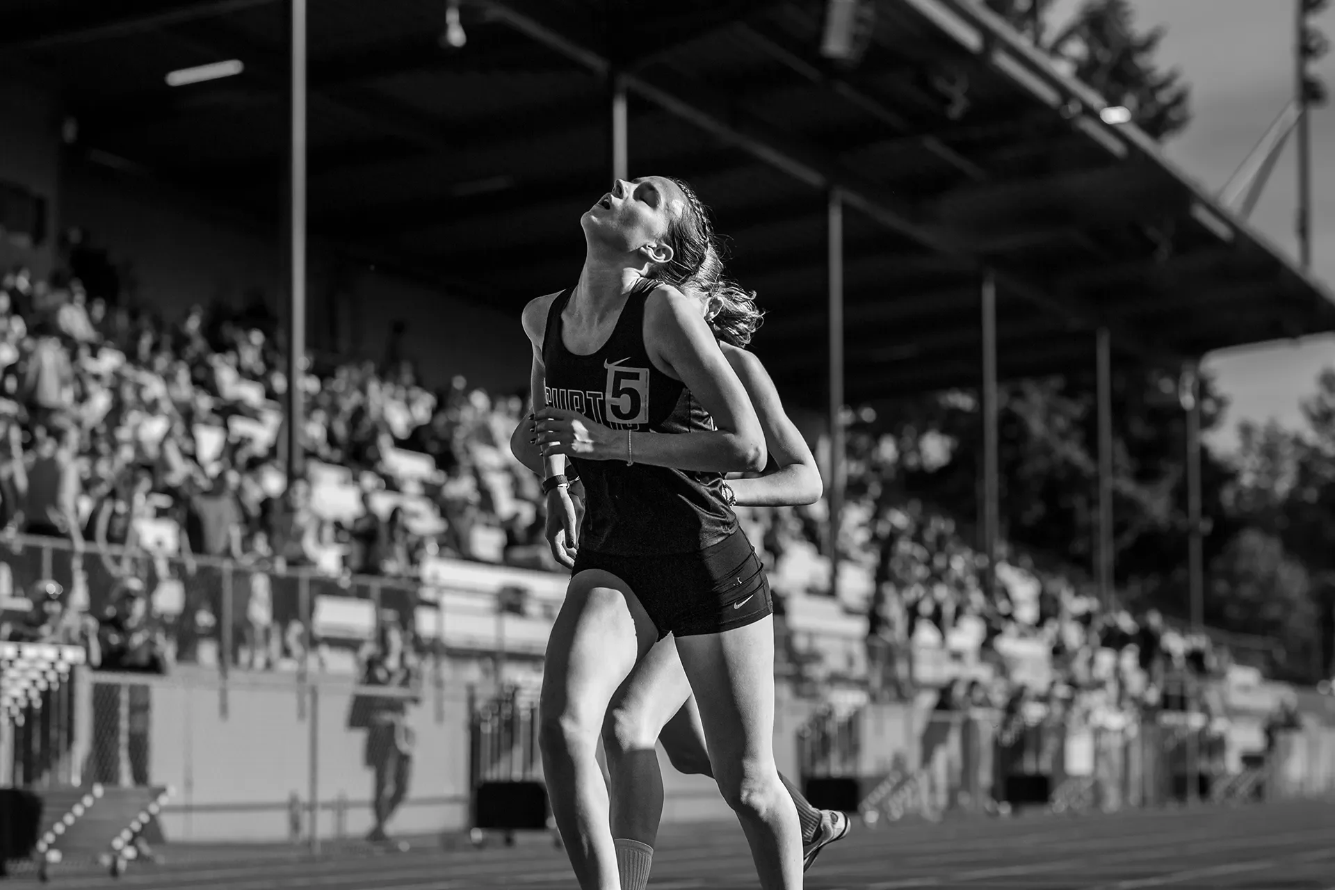 Charlotte White of Curtis crossing the line in the 1600m at the 2026 district championships