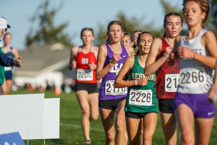 Elin Beeler of Lake Washington finishing seventh in the 4A girls race at the 2025 WIAA State Cross Country Championships in Pasco WA