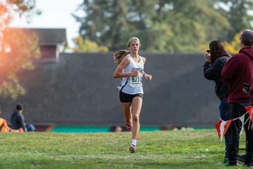 Kate Behrens of Enumclaw cross country. Photo by Russell Moore.