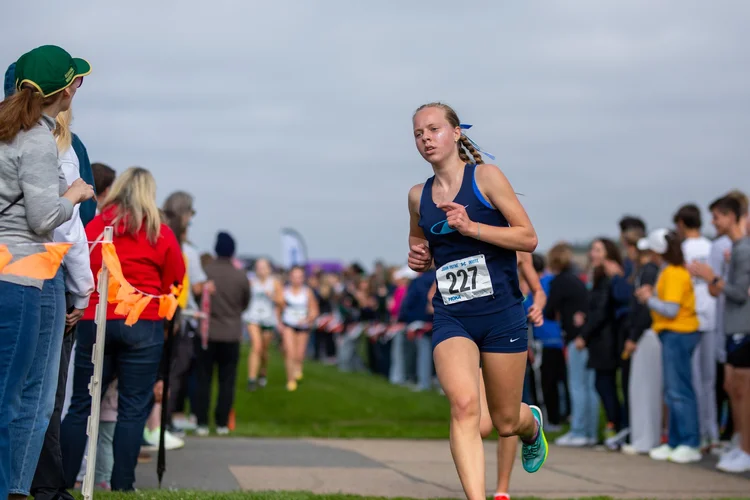 Brynnlie Upchurch of Gig Harbor running at the John Payne Invitational (2026)