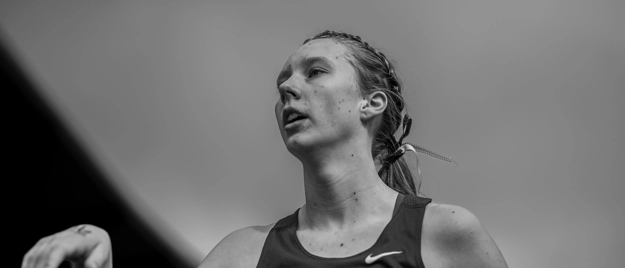 Auburn High School runner showing intense exertion during the Bear Relays.