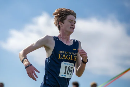 Micah Henry of Pope John Paul II cross country. Photo by Russell Moore.
