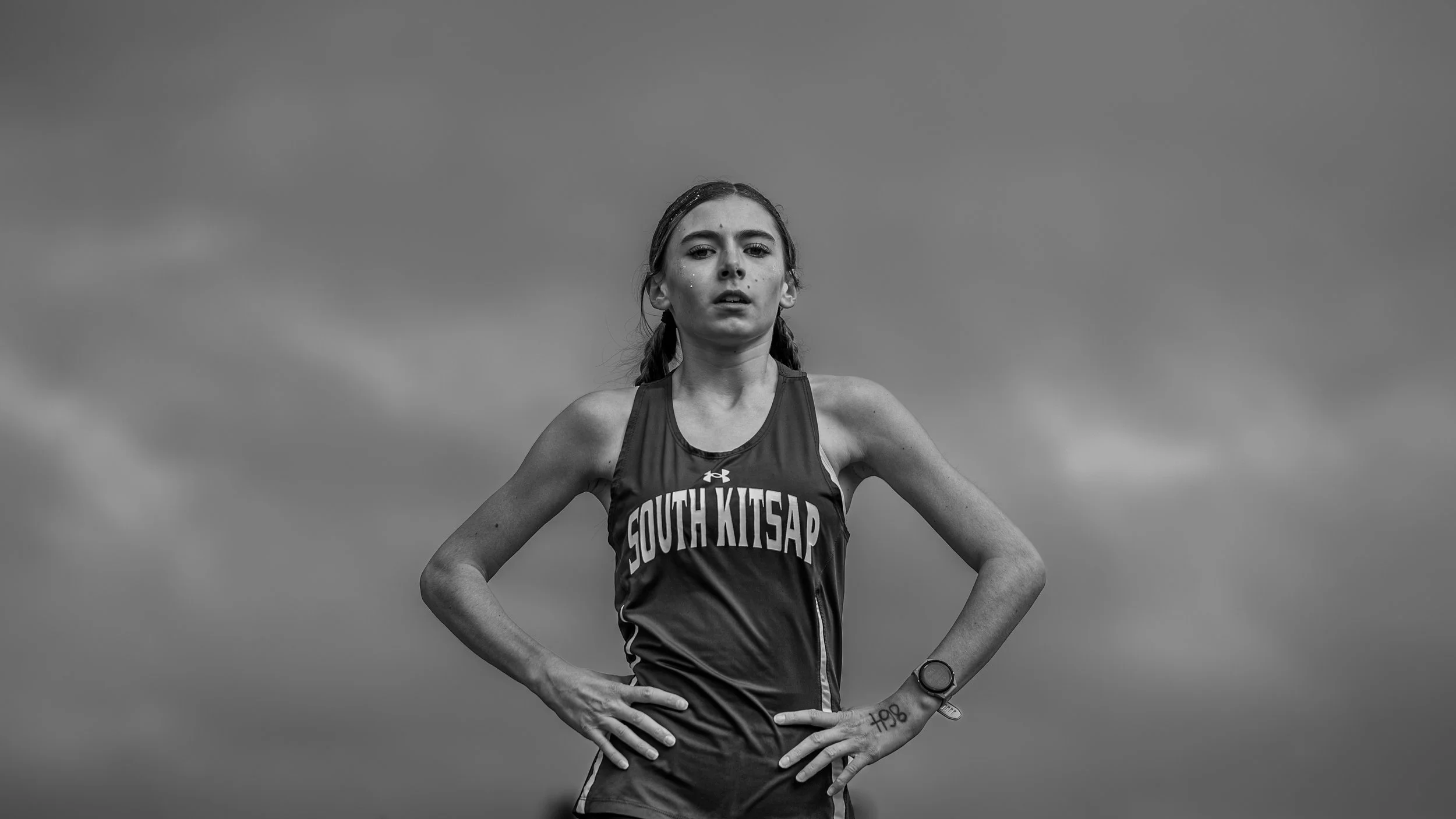 High contrast black and white portrait of a South Kitsap track athlete at the Bear Relays.