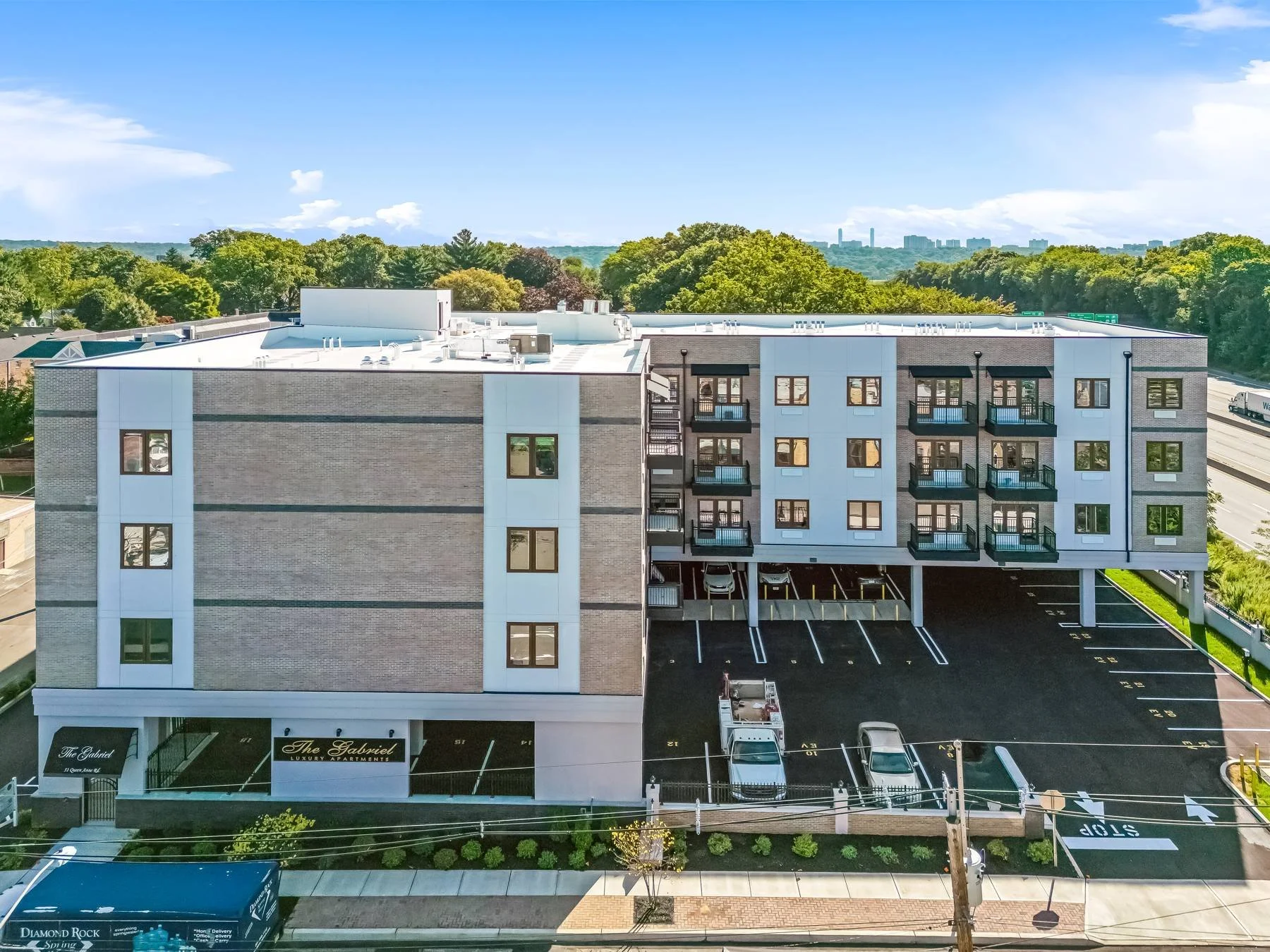 The Gabriel Bogota at 51 Queen Anne Road with the Manhattan skyline in the distance