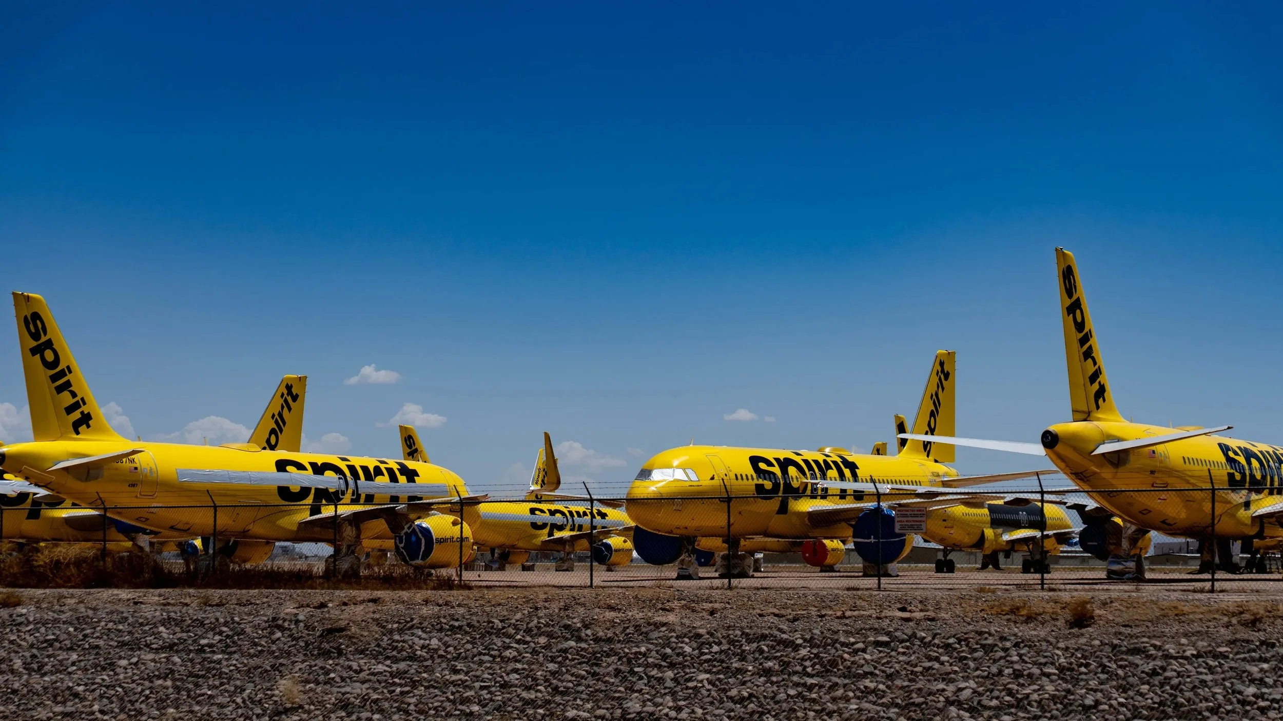 Spirit Airlines Airbus A320s in long-term storage with windows taped up