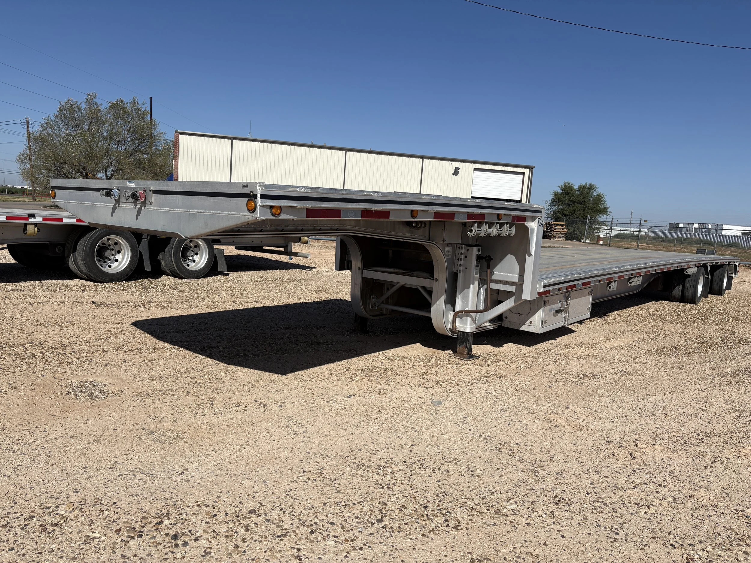 Detailed view of the 2024 MAC all-aluminum drop deck trailer