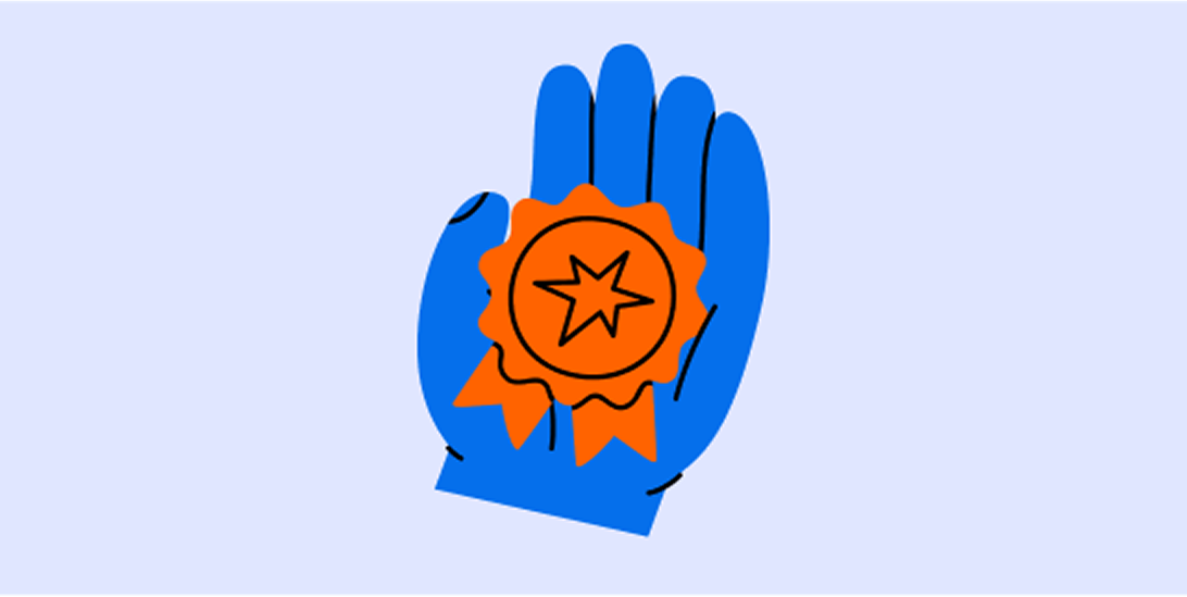 hand holding award ribbon