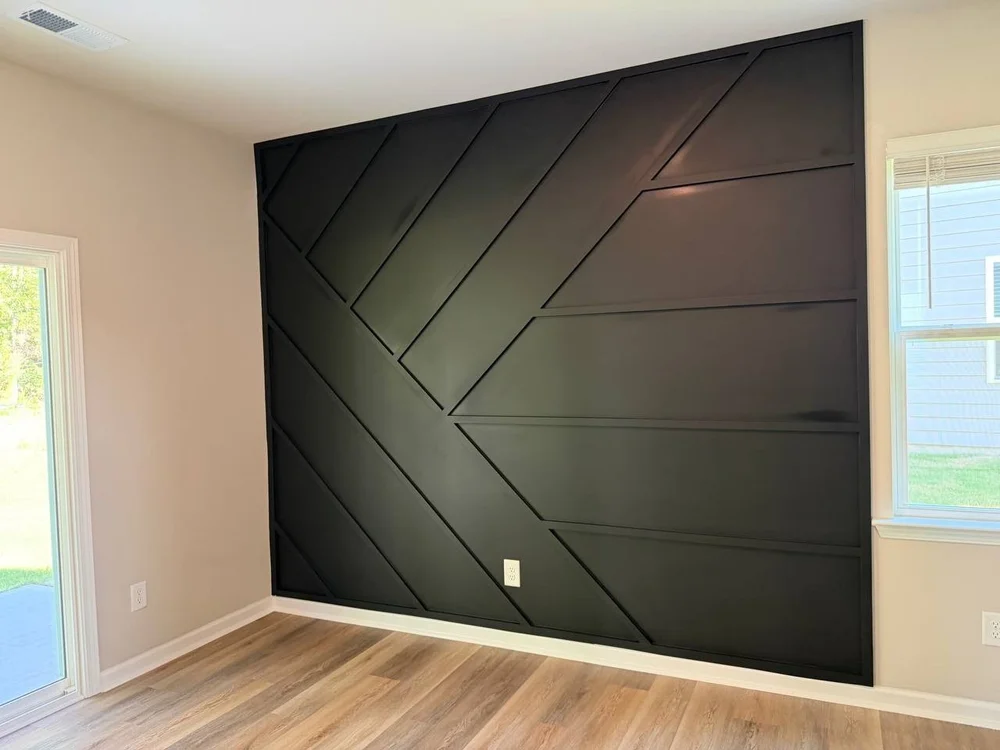 Black geometric accent wall in a living room, Matthews NC