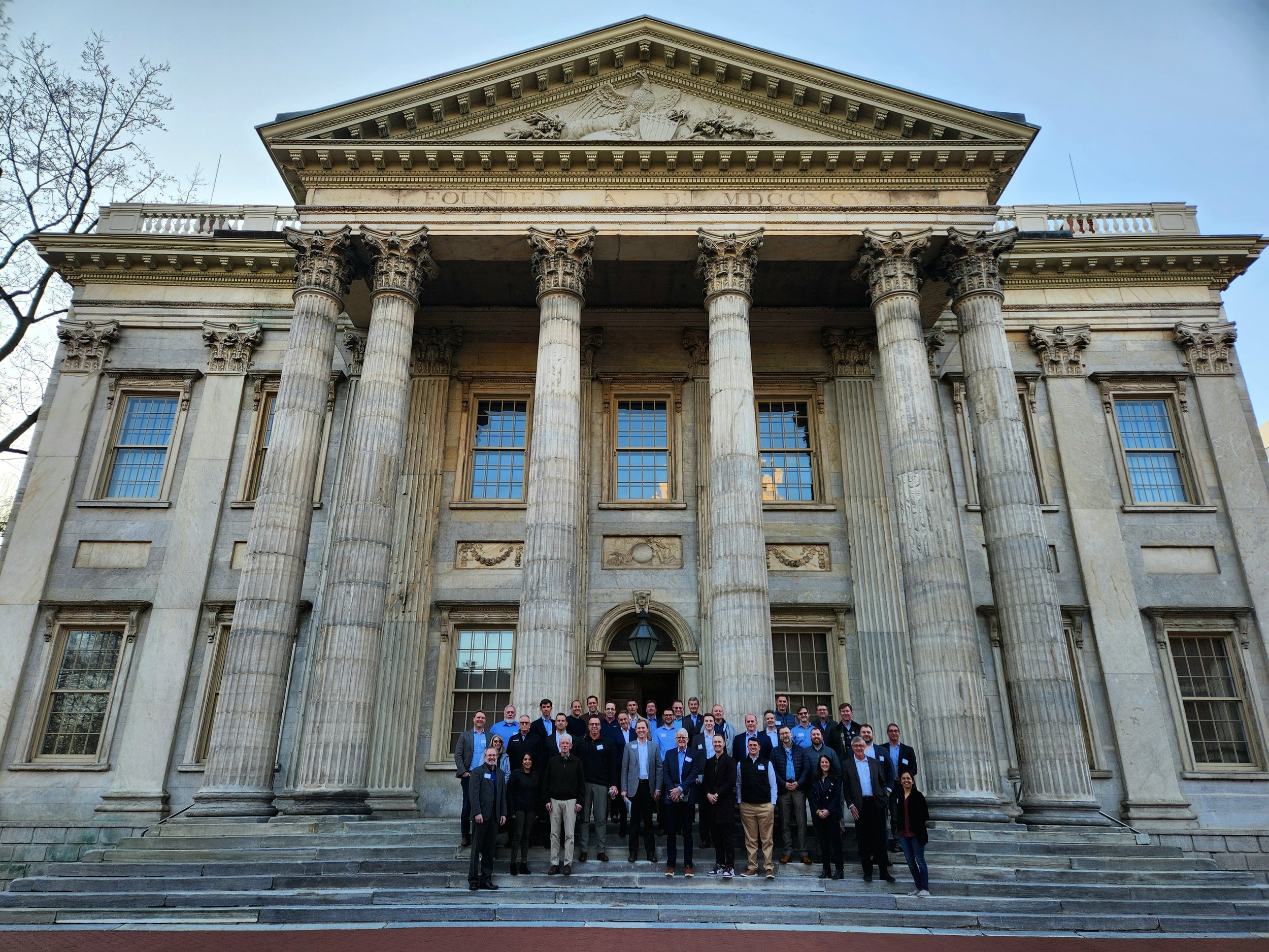 The cohort on the steps of the First Bank of the United States