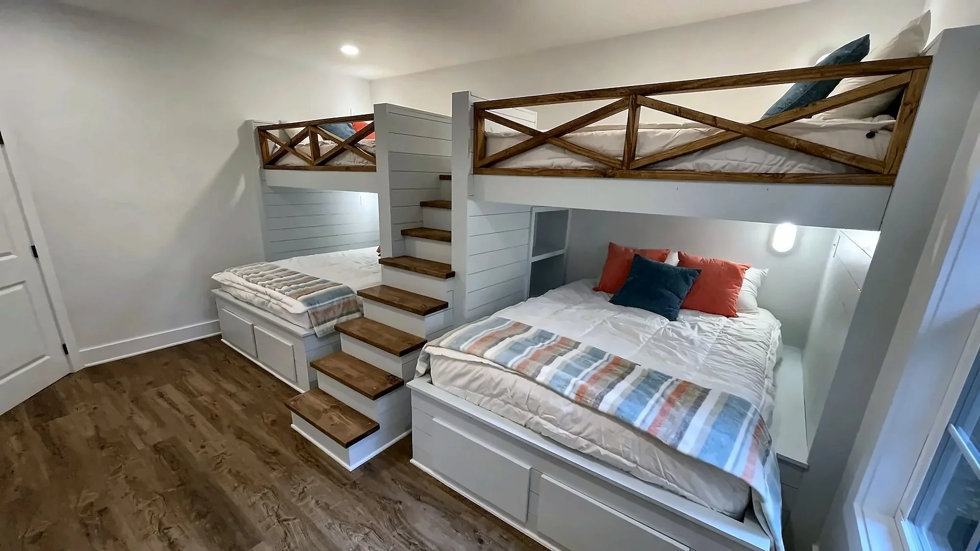 Bunk room in a sunroom and bunk room home addition by Old Number One Customs, Alabama