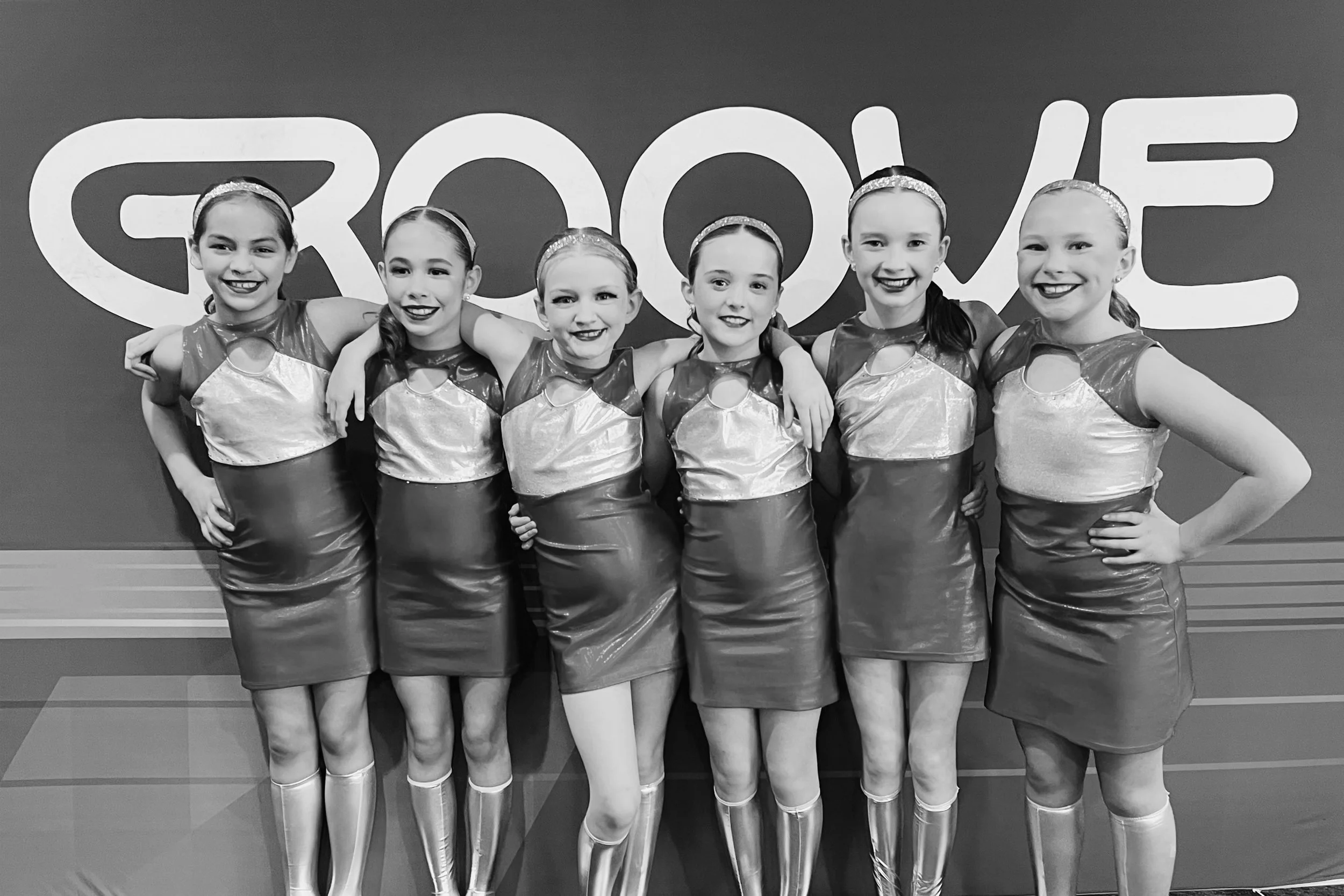 509 Collective dancers backstage supporting one another