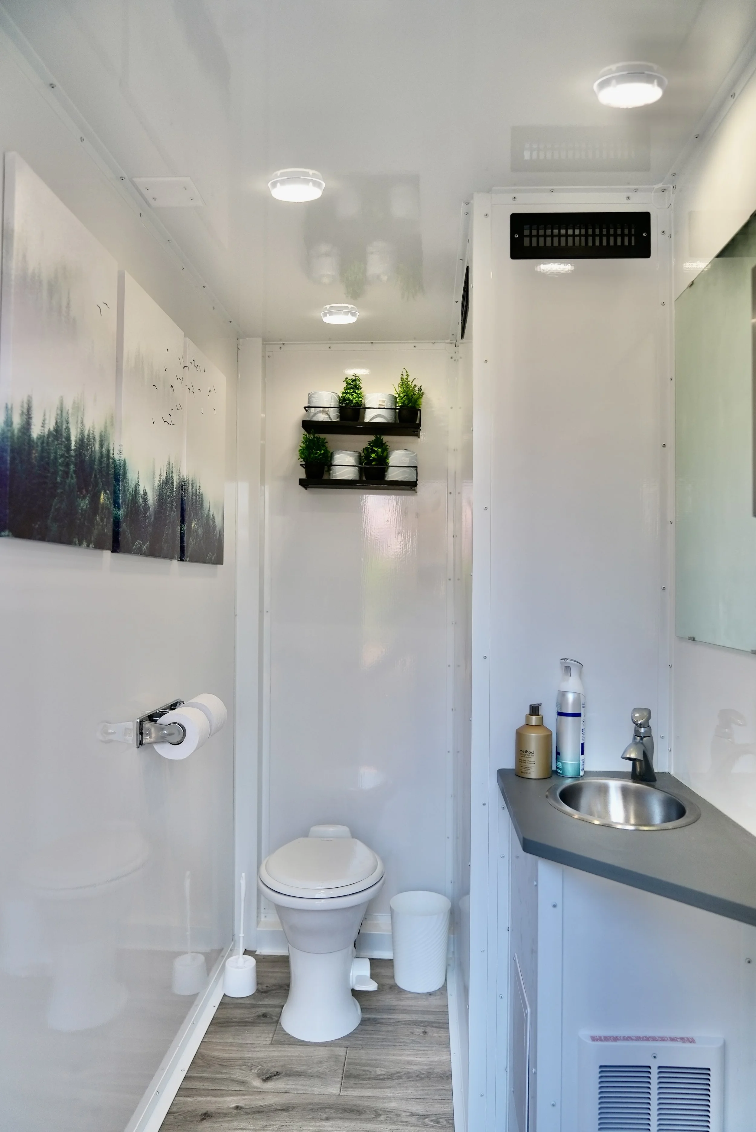 Inside the 3-stall luxury restroom trailer