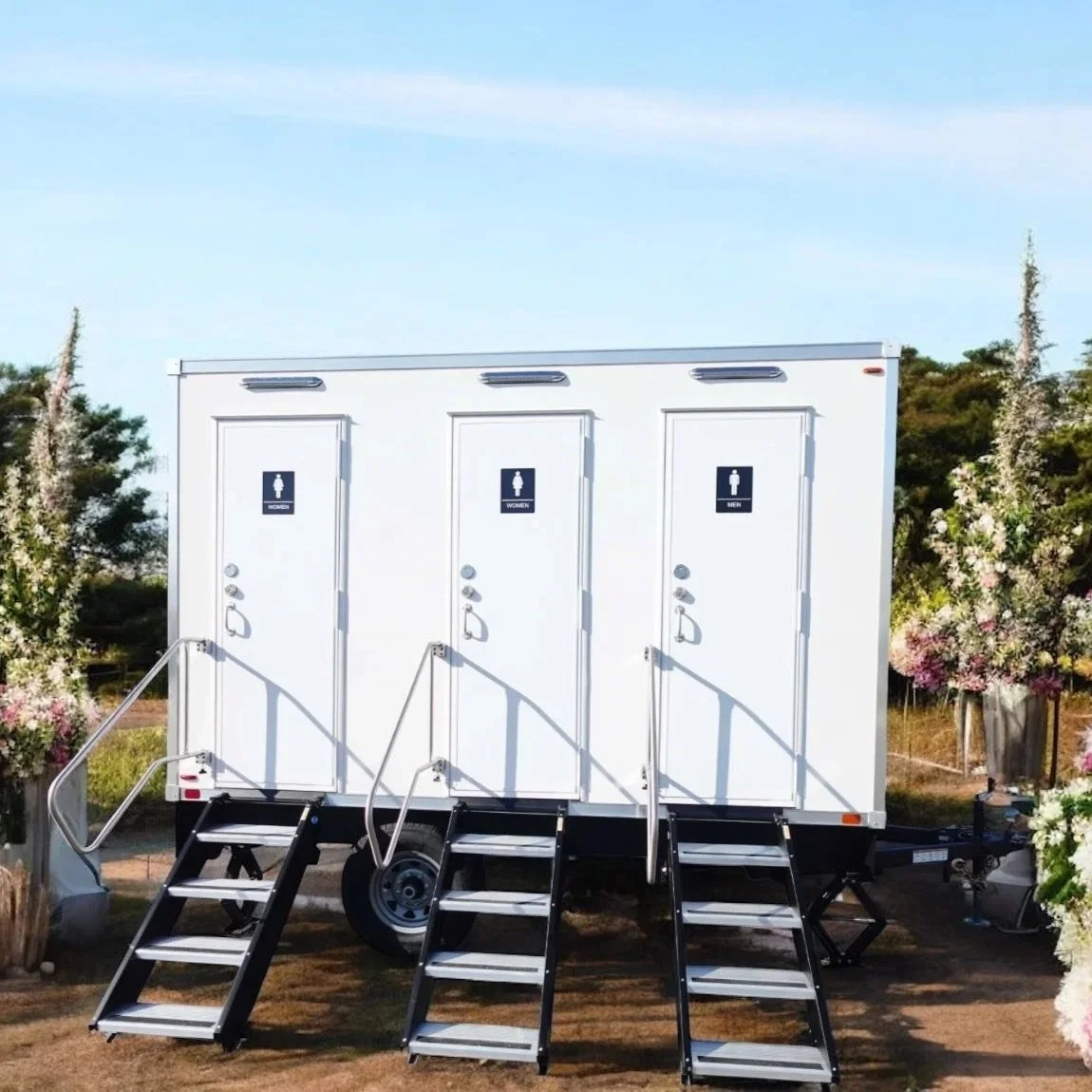 3-stall luxury restroom trailer with velvet rope entry