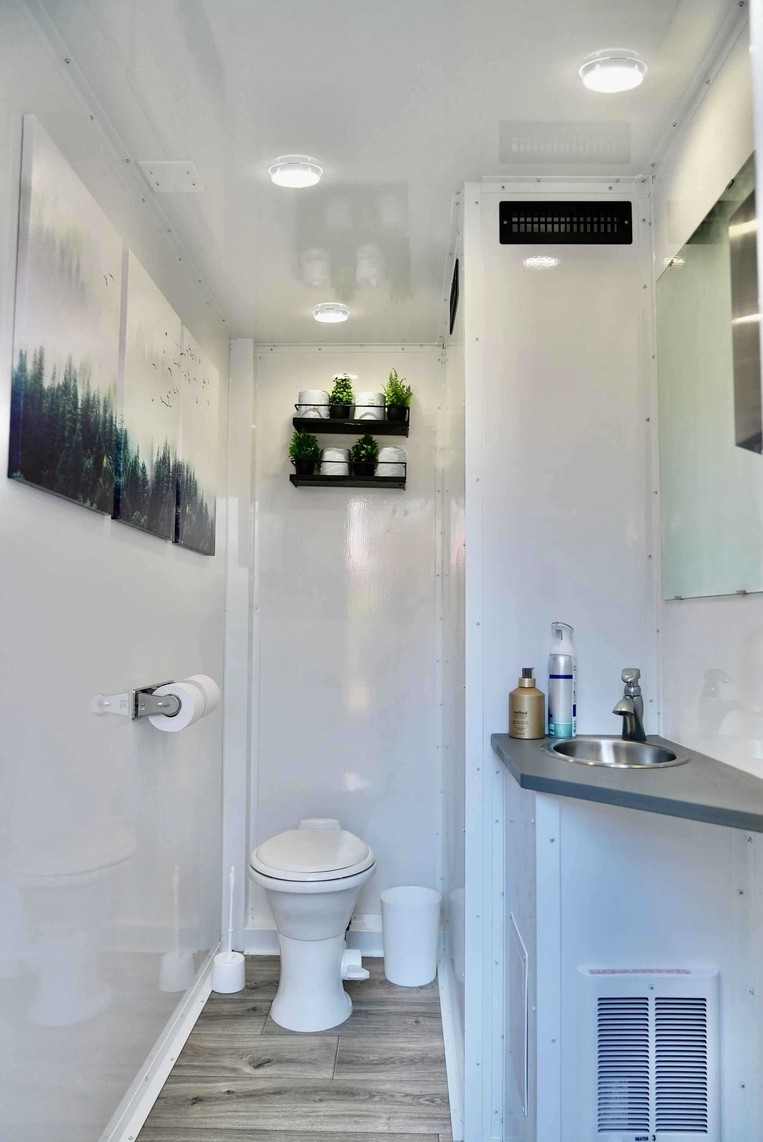Interior of a Loo Haven 3-stall luxury restroom trailer