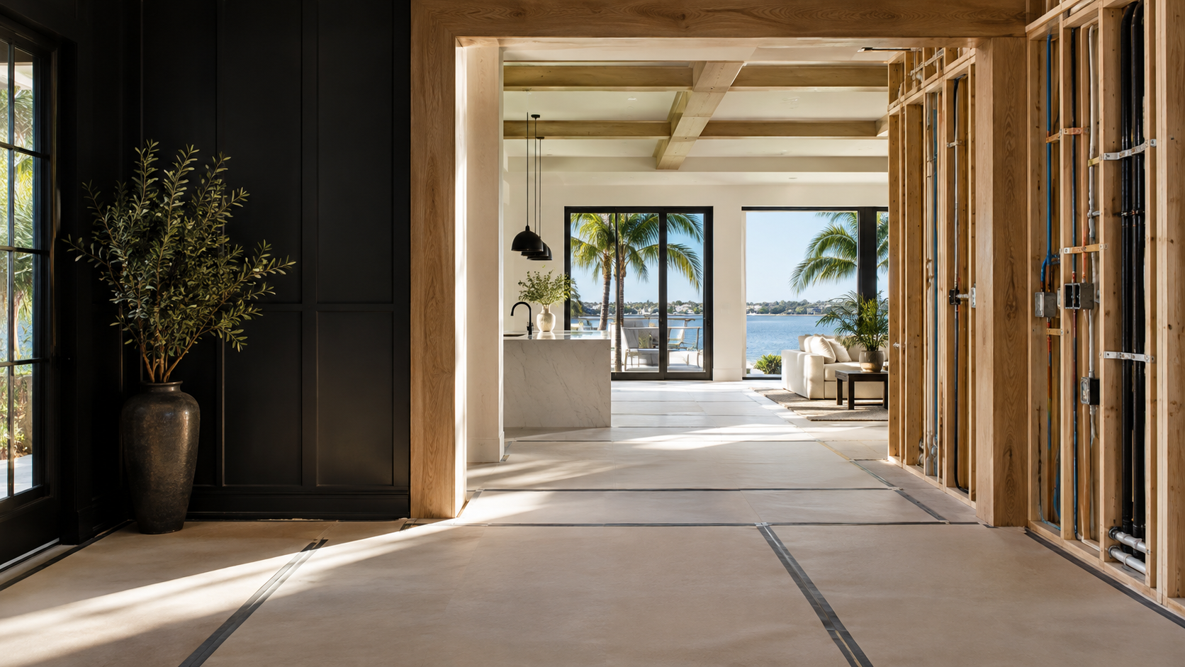 Illustrative Florida renovation with a framed interior opening, visible wall systems and protected floors