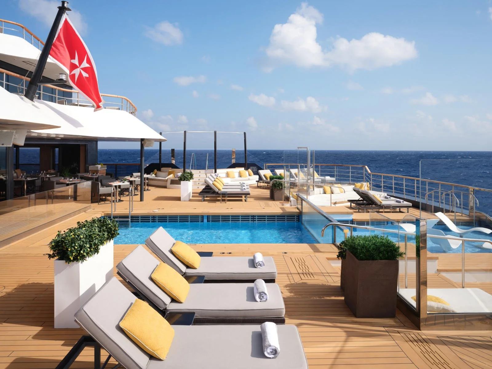Ritz-Carlton Yacht Collection Evrima Infinity Pool and Lounge Area