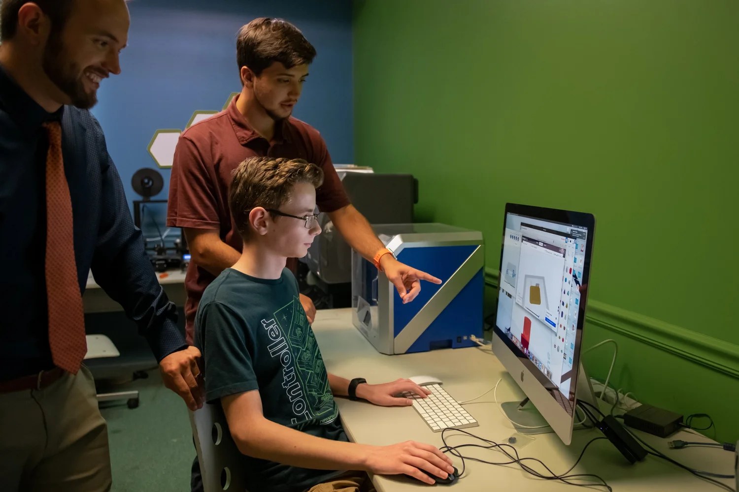 An LCCS teacher working with students