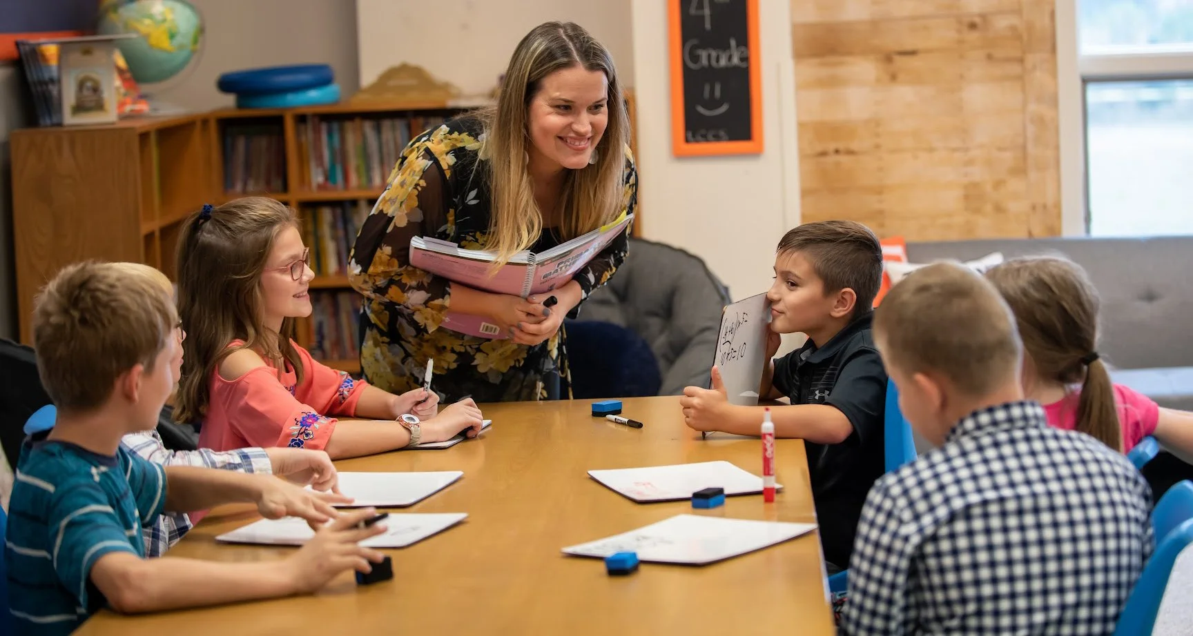 LCCS teacher and students in a classroom