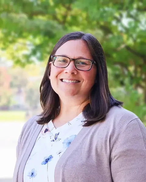 Amber Fidler, LCCS Admissions Coordinator, smiling outdoors
