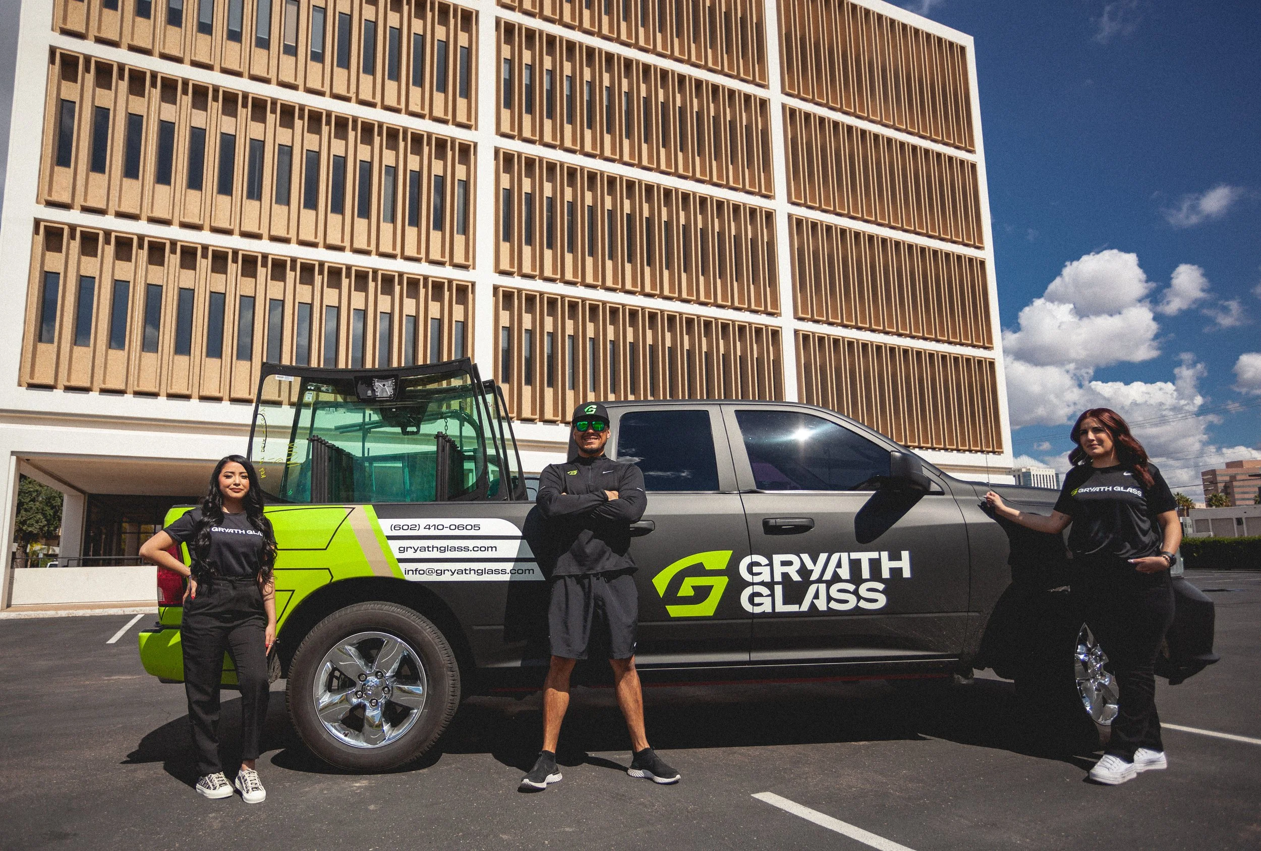 Ivan, Ariana, and Cynthia standing in front of a Gryath Glass truck