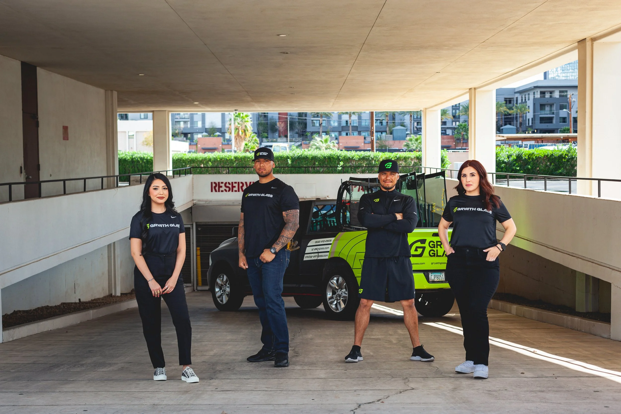 The full Gryath Glass team standing in front of the branded truck