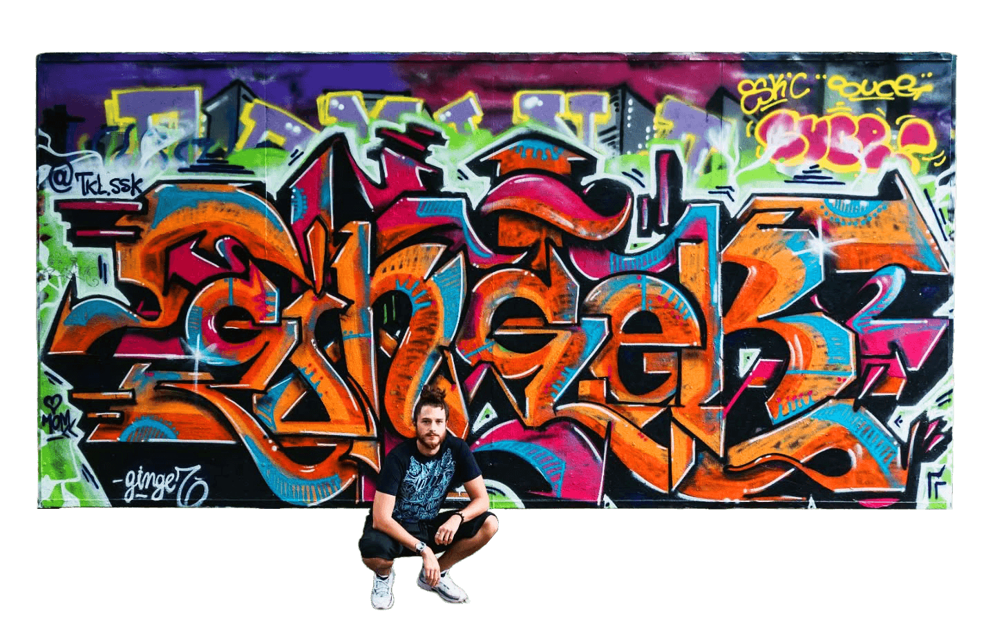 Wide graffiti composition — hard angles and smooth blends, signed @tkl_ssk.