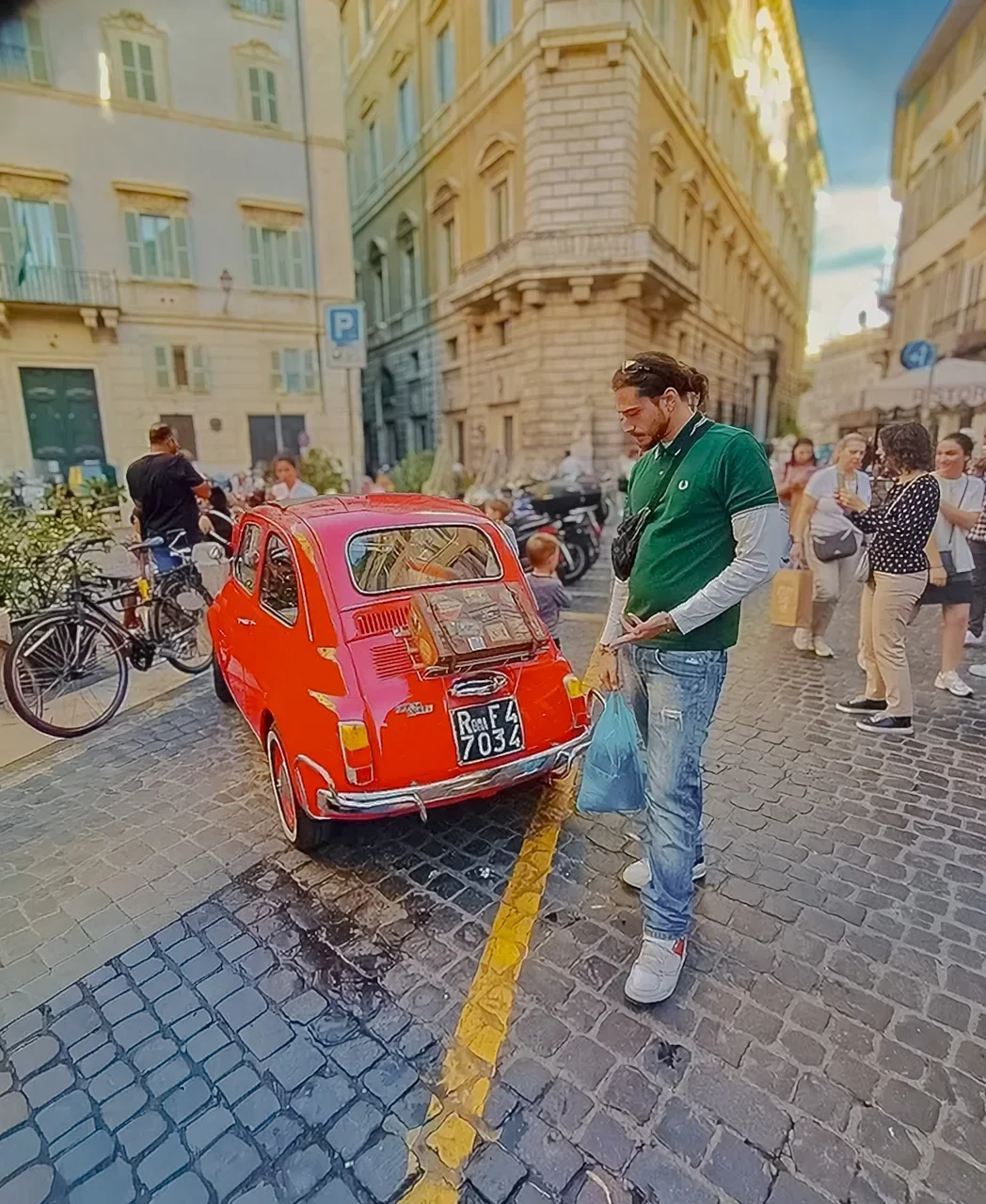 TKL 137 beside a red classic car in Europe