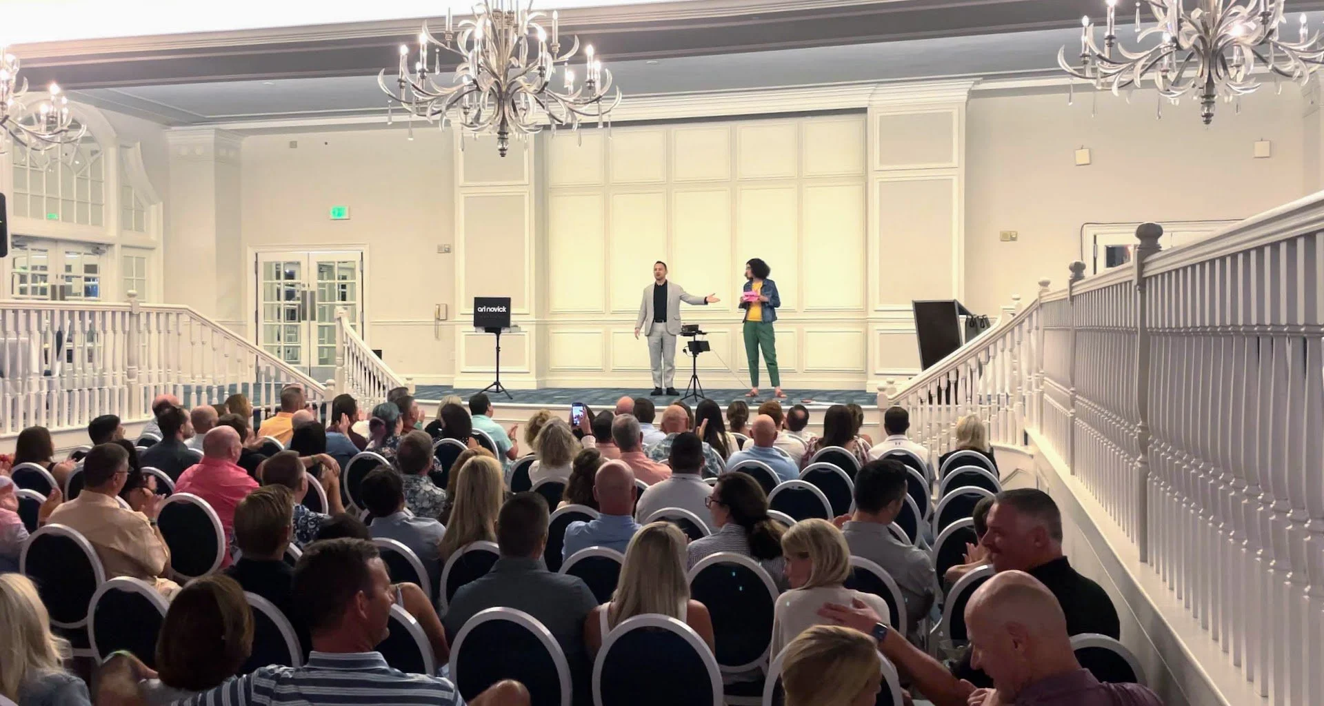 Ari Novick performing as a corporate magician at an event in Coconut Grove, Florida