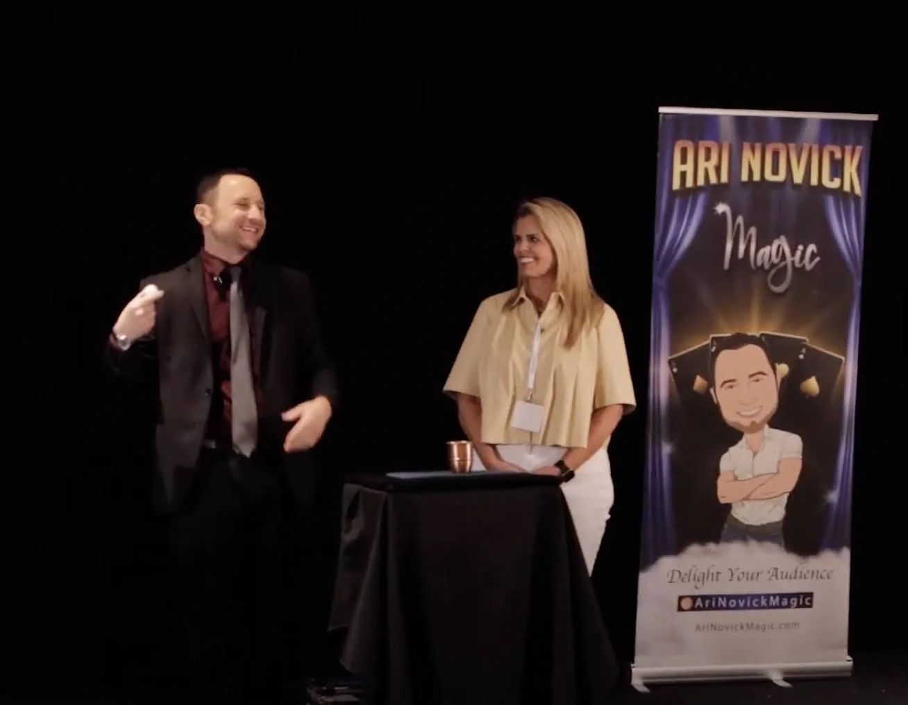 Corporate magician Ari Novick performing engaging close-up magic for attendees at a corporate event in Henderson, Nevada.
