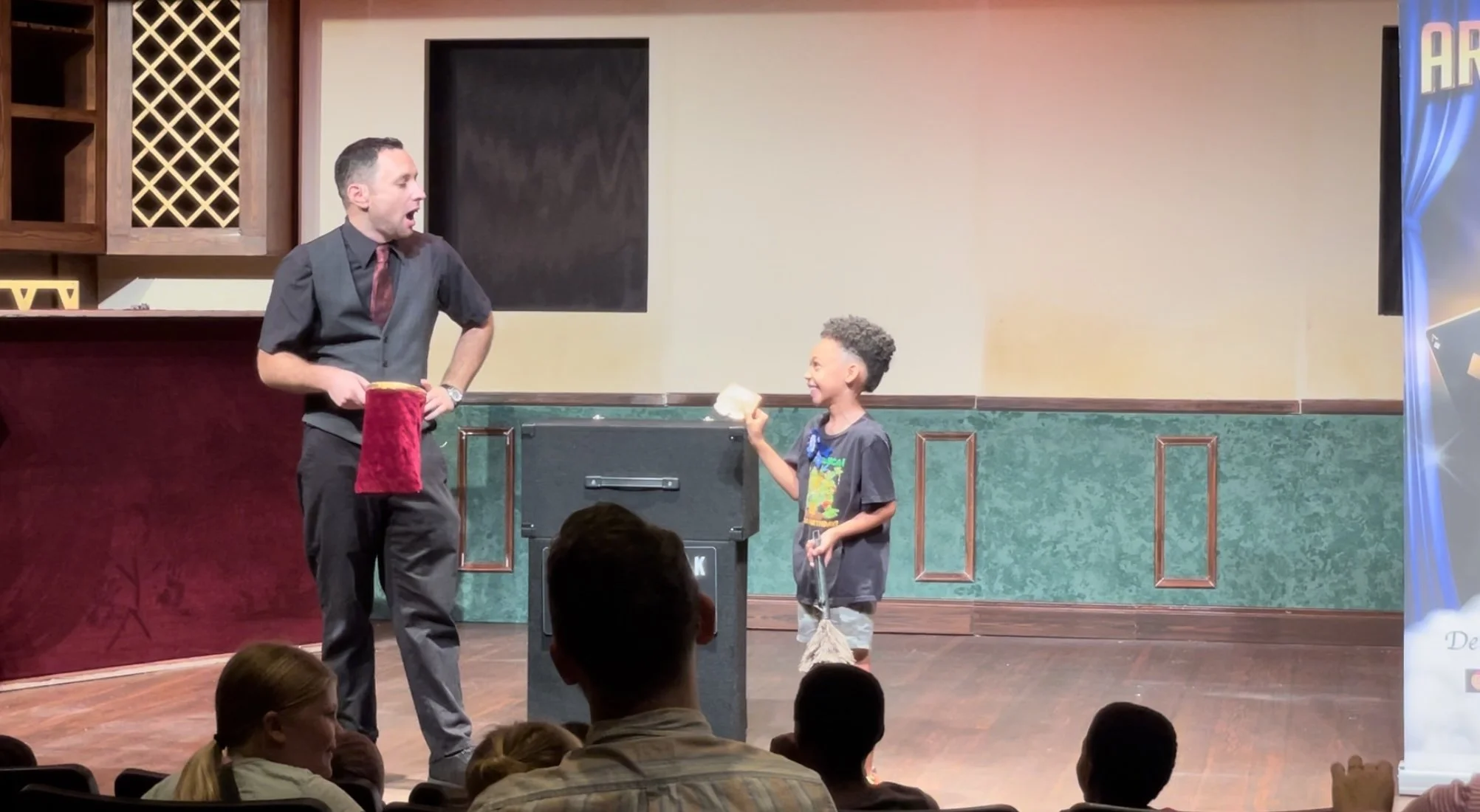Kids magician Ari Novick entertaining children at a Tampa magic show.
