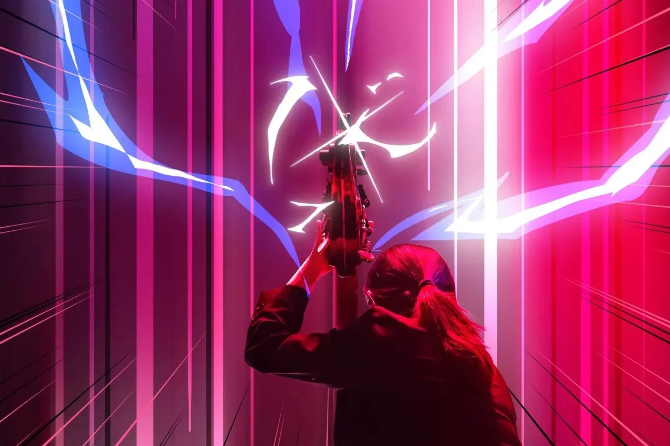 A violinist in dramatic red and blue light