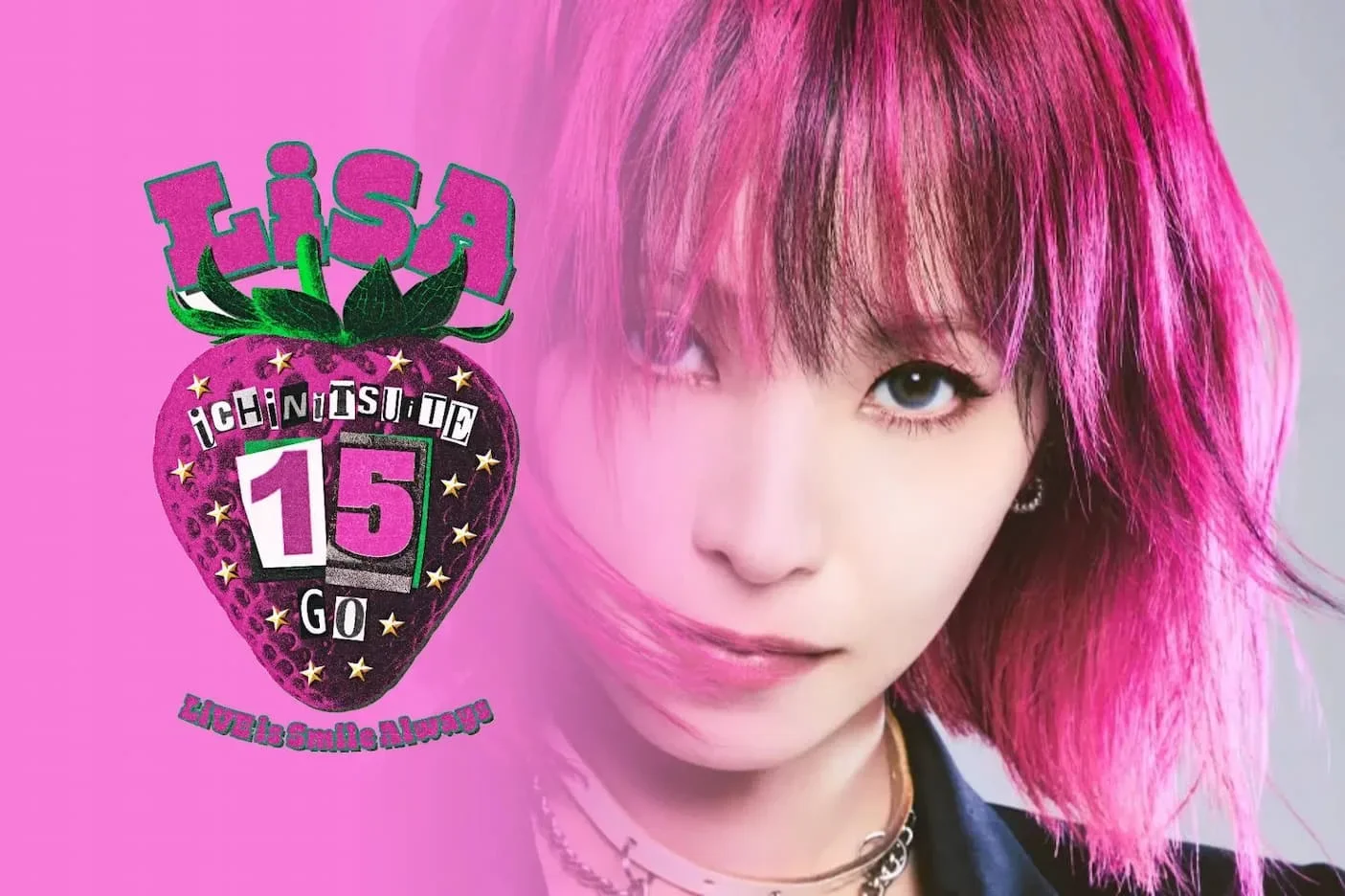 LiSA with pink hair beside her 15th anniversary strawberry logo