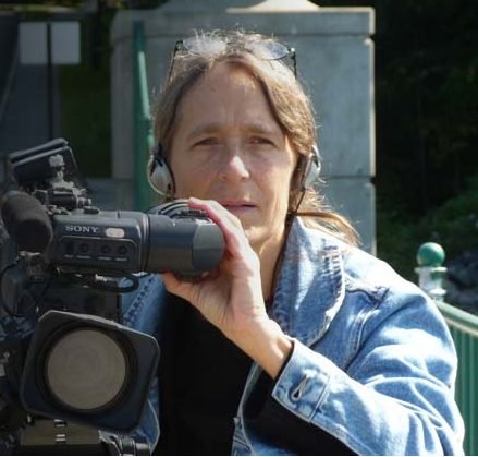 Nora Jacobson behind a camera